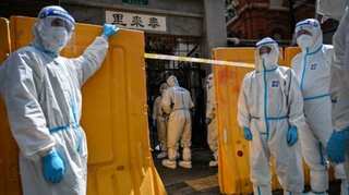 Shanghai parents fear separation from kids after positive Covid test