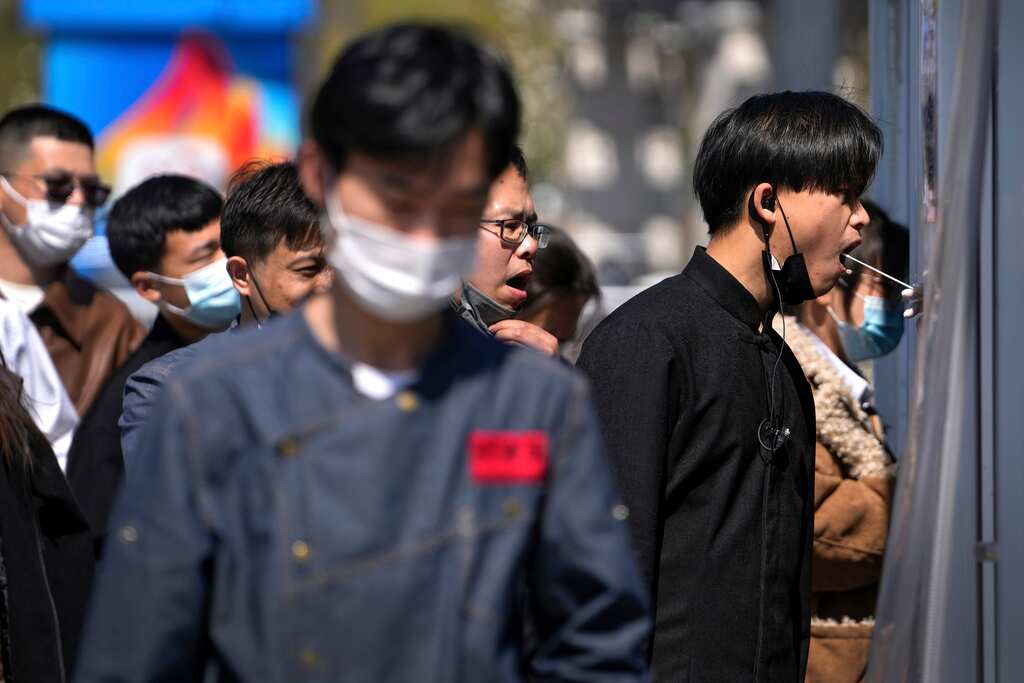 China official signals commitment to ‘zero Covid’ as Shanghai battles outbreak
