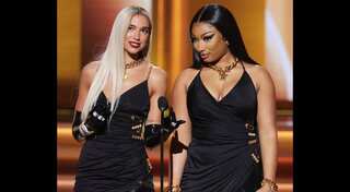 Dua Lipa, Megan Thee Stallion have a fashion face off in matching Versace at the Grammys 2022