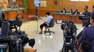 Indonesian teacher condemned to death for raping 13 students