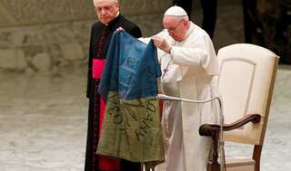Russia-Ukraine war: Pope, holding Ukrainian flag, condemns Bucha killing
