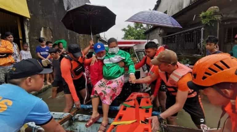 Death toll from tropical storm in Philippines reaches 42, rescuers search for survivors