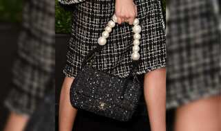 Watch: Russian social media influencers cutting up expensive luxury handbags. Here's why