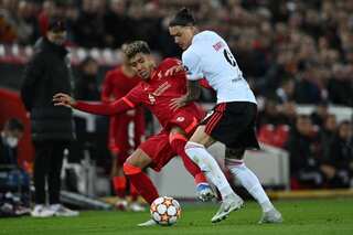 Roberto Firmino fires Liverpool into UEFA Champions League semis despite Benfica rally