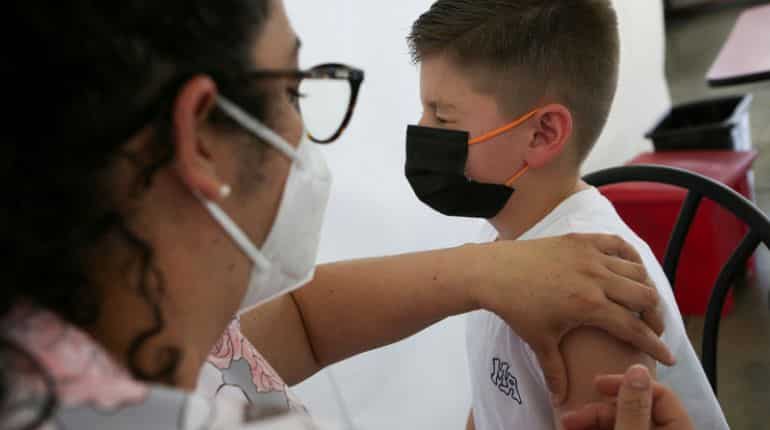 Pfizer-BioNTech say booster dose increases protection against Omicron in kids aged 5-11