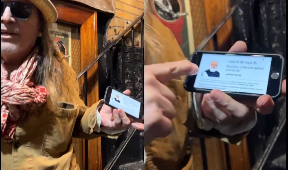 Social media furious over video of US man appearing to mock PM Modi over Covid certificate Social media furious over video of US man appearing to mock PM Modi over Covid certificate