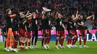 Bayern down Dortmund to win 10th straight Bundesliga title