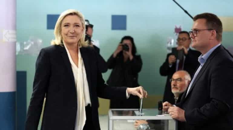 Marine Le Pen casts her vote