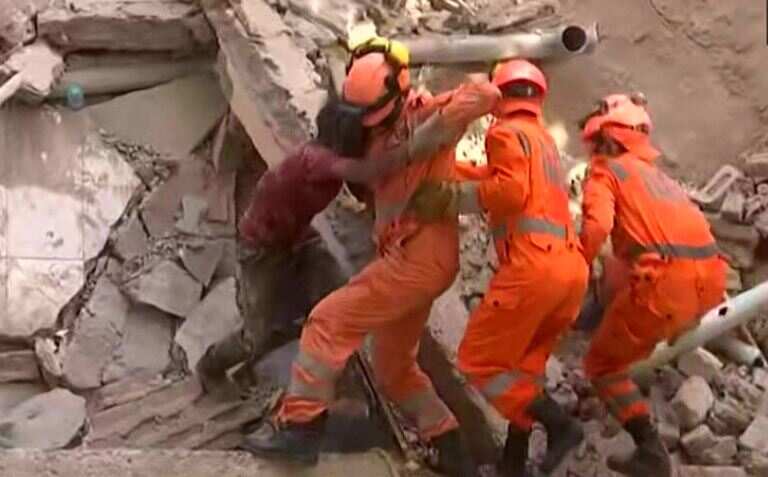Heroic moment caught on camera: Indian rescuers extract boy trapped in house collapse