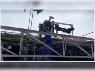 Optimus Prime? Nope, just a giant robot doing railway repair in Japan