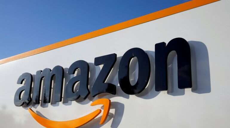 Amazon reports rare quarterly loss as online shopping slows