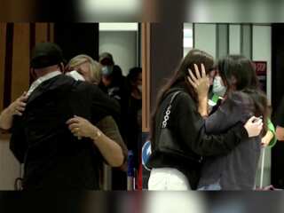 New Zealand welcomes Australian visitors with warm hugs, tears and Maori performers