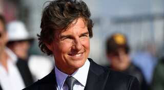 Tom Cruise arrives in style for world premiere of 'Top Gun: Maverick' in a chopper he piloted