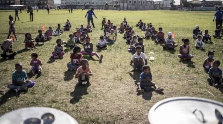 Despite an increase in COVID-19 cases, South Africa to drop masks for kids