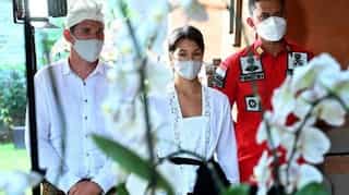Bali to deport Russian couple for nude photos on sacred tree