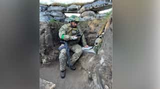 Meet this Ukrainian professor who gives lessons from front lines while battling Russians