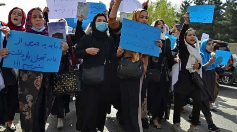 Afghan women protest Taliban decree to cover faces Afghan women protest Taliban decree to cover faces
