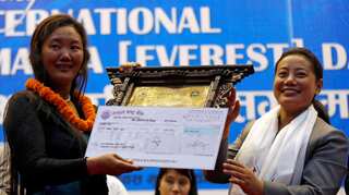 Nepali climber Lhakpa Sherpa breaks her own record by scaling Mount Everest tenth time