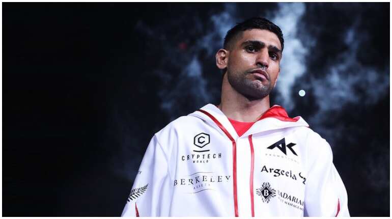Britian's former light-welter world champion Amir Khan announces retirement from boxing Britian's former light-welter world champion Amir Khan announces retirement from boxing