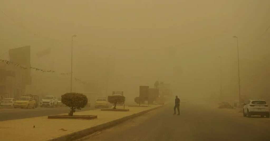 Iraqis choke under a blanket of dust as severe sandstorm hits Baghdad