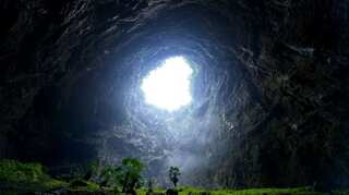 Watch | Enormous sinkhole with ancient forest inside discovered in China