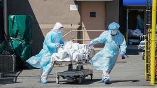 Coronavirus in New York: Largest city in US raises alert level from medium to high as cases surge