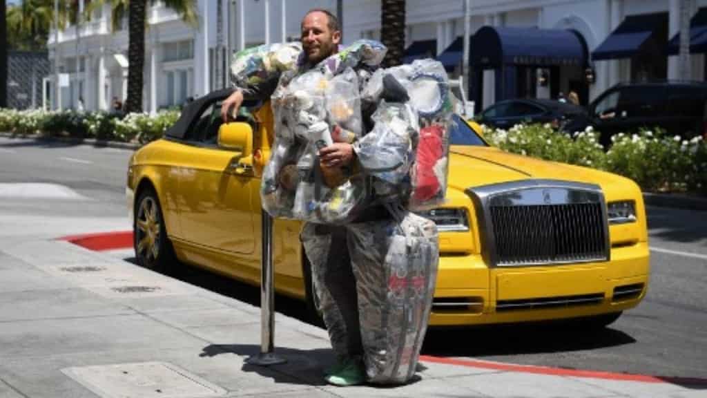 'Put trash in its place': This is why an environmental activist is wearing trash in posh LA