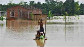 Millions stranded, dozens dead as flooding hits Bangladesh and India