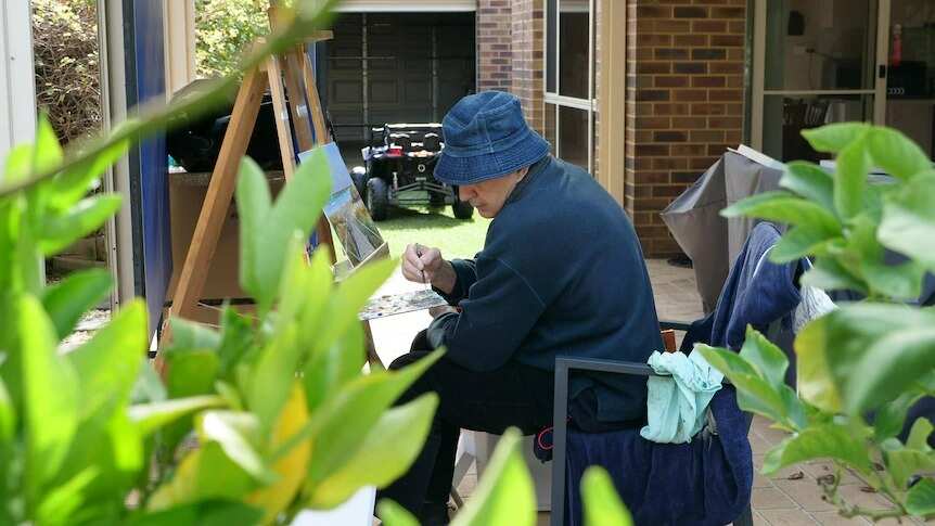 Ukrainian Artist paints to raise funds for war