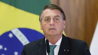 Bolsonaro views disaster zone from air after deadly Brazil rains