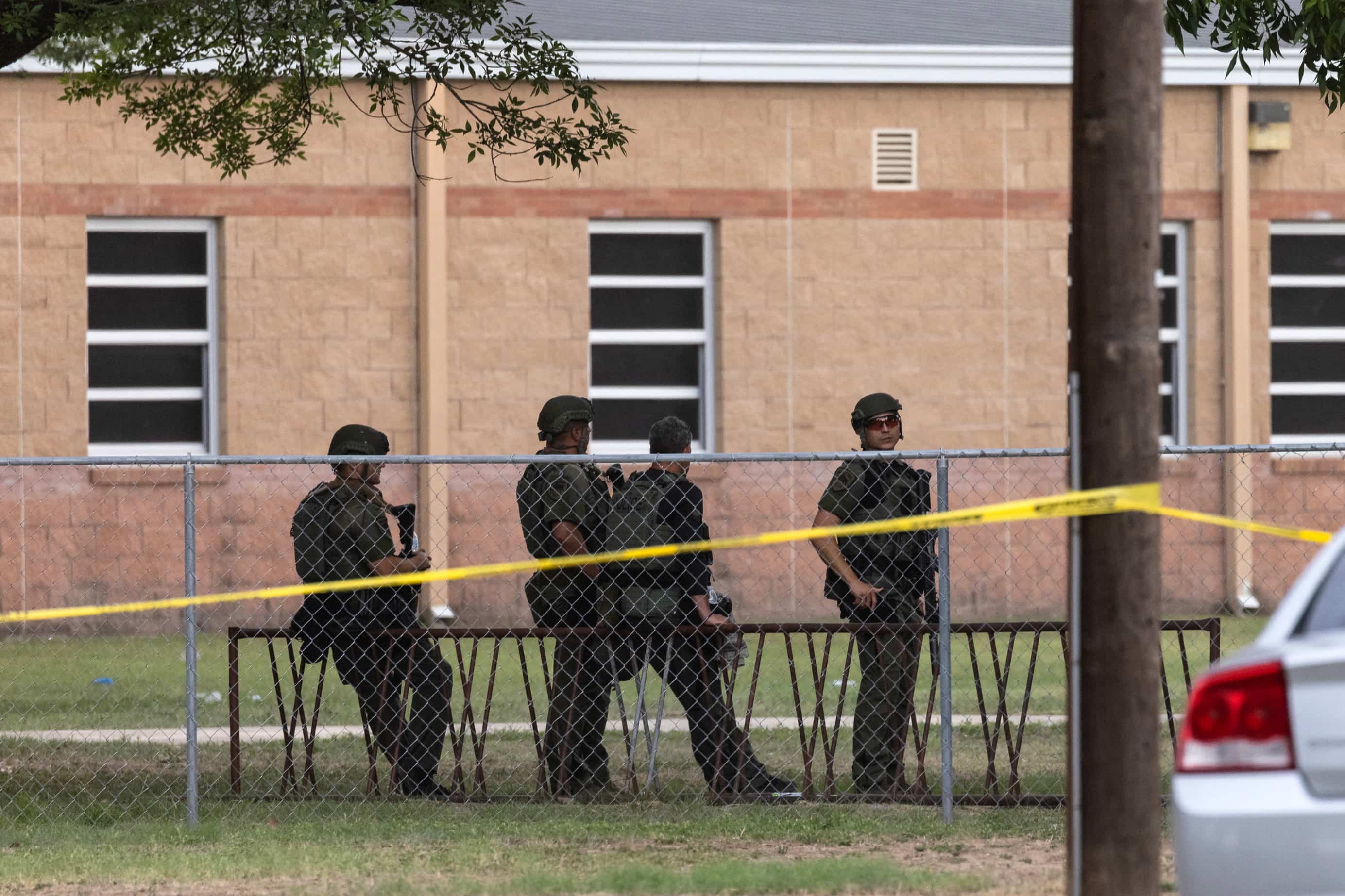 Law enforcement people at the school where children were killed on May 24, 2022 in Uvalde, Texas.