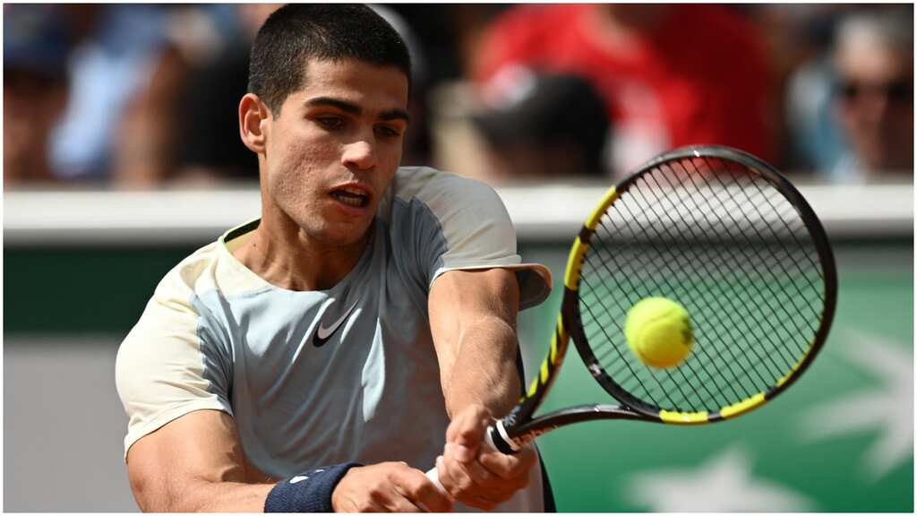 Carlos Alcaraz survives match point to beat fellow Spaniard Albert Ramos-Vinolas in five-set thriller