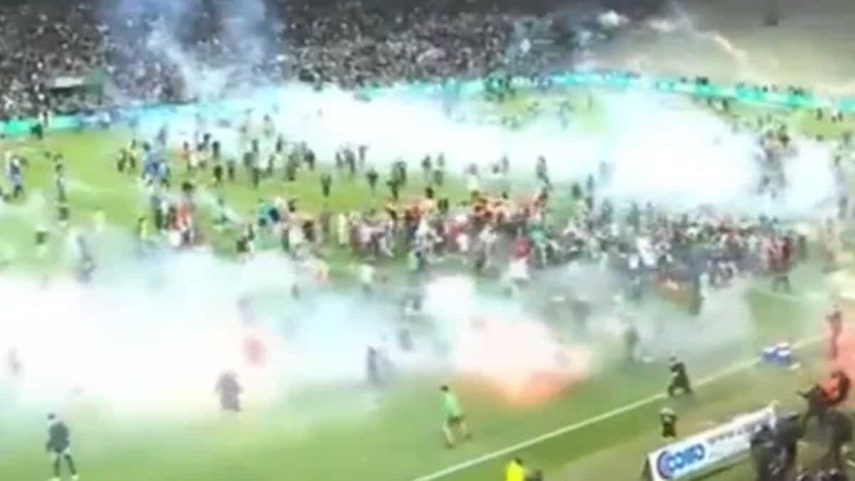 Tear gas used by French cops as Saint-Etienne fans attack their players after Ligue 1 relegation - WATCH Tear gas used by French cops as Saint-Etienne fans attack their players after Ligue 1 relegation - WATCH