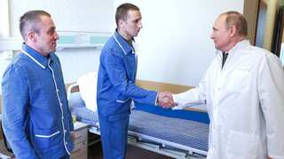 Did Putin fake his visit to military hospital? Photos reveal familiar face