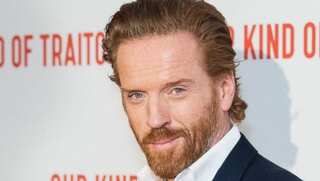 Actor Damian Lewis and former Northern Ireland leader honoured by Queen Elizabeth