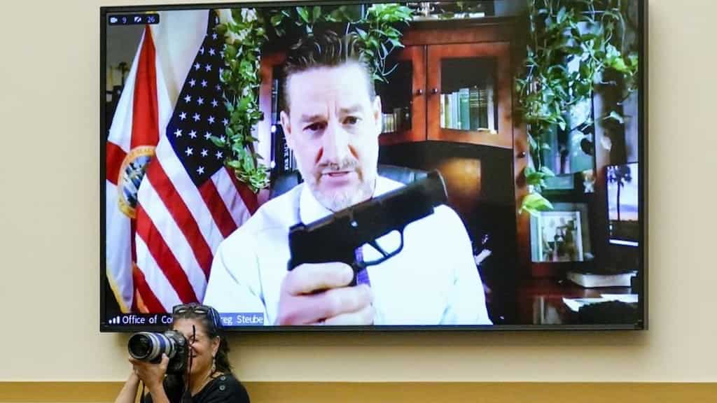 US lawmaker shows off guns at House hearing for new gun violence prevention legislation to make a point