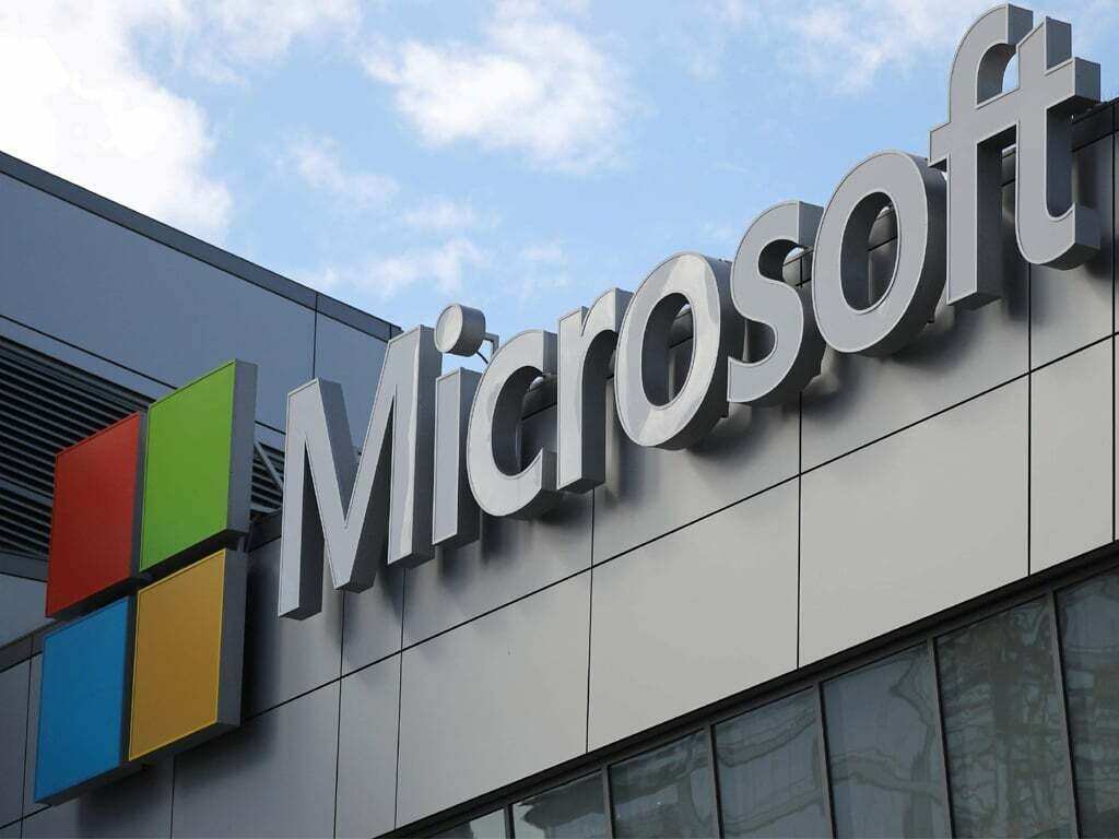 Microsoft warns of Forex hit, cuts 4th quarter forecast