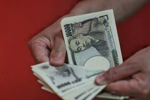 Asian shares fall as oil lingers above USD 120, yen sinks Asian shares fall as oil lingers above USD 120, yen sinks
