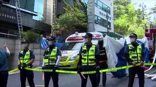 In a suspected arson, at least seven people killed in South Korean building fire