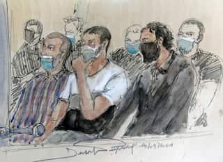 Prosecutors ask for life sentences for 12 men at trial for Paris terror attack