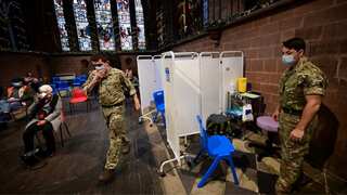 Scientists warn that mixed messages about threat of coronavirus could reduce uptake of jabs