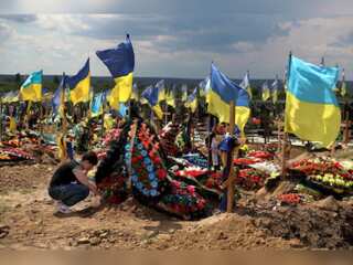 In pics: Ukraine bids farewell to its war heroes