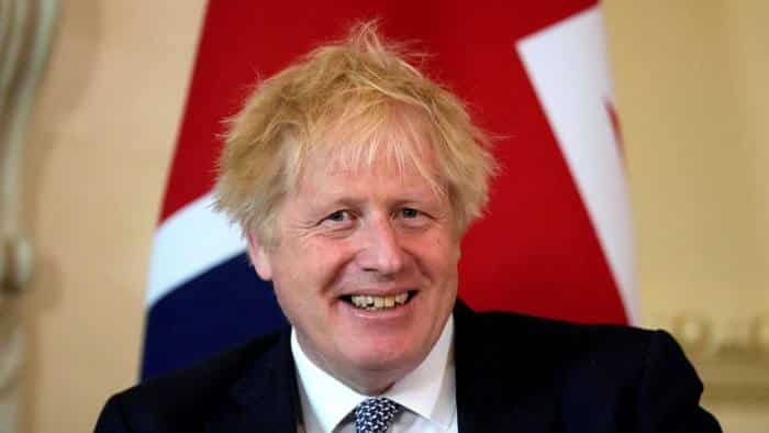 Despite backlash, UK PM Boris Johnson defends British migration policy