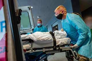 Covid-related deaths fall sharply while cases surge in United States: Report