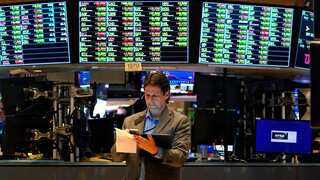 Asian markets waver as investors await central bank rate decisions