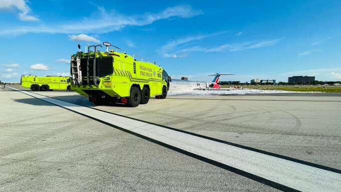 Miami airport plane crash: Red Air aircraft with 126 onboard catches fire after landing gear collapses. Watch