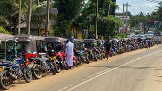 A year after crisis, Sri Lanka allows 3 foreign oil companies to sell fuel