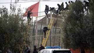 Spain says deadly migrant rush 'attack' on its territory