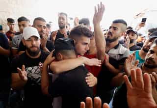 West Bank clashes: Militants fired on Jewish pilgrimage shrine; three Israelis, 64 Palestinians wounded