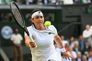 Wimbledon: Ons Jabeur rallies past Marie Bouzkova to reach maiden major semi-final